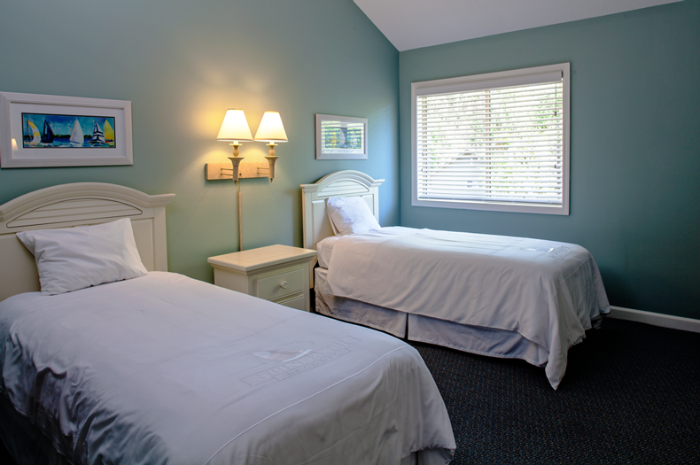 two twin beds in room