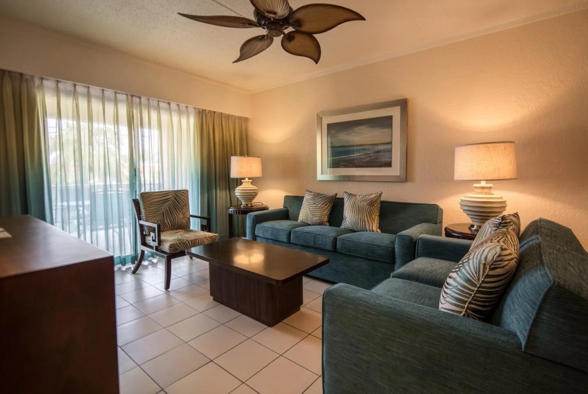 Casa Del Mar Beach Resort Dining Area Living Area in Suite