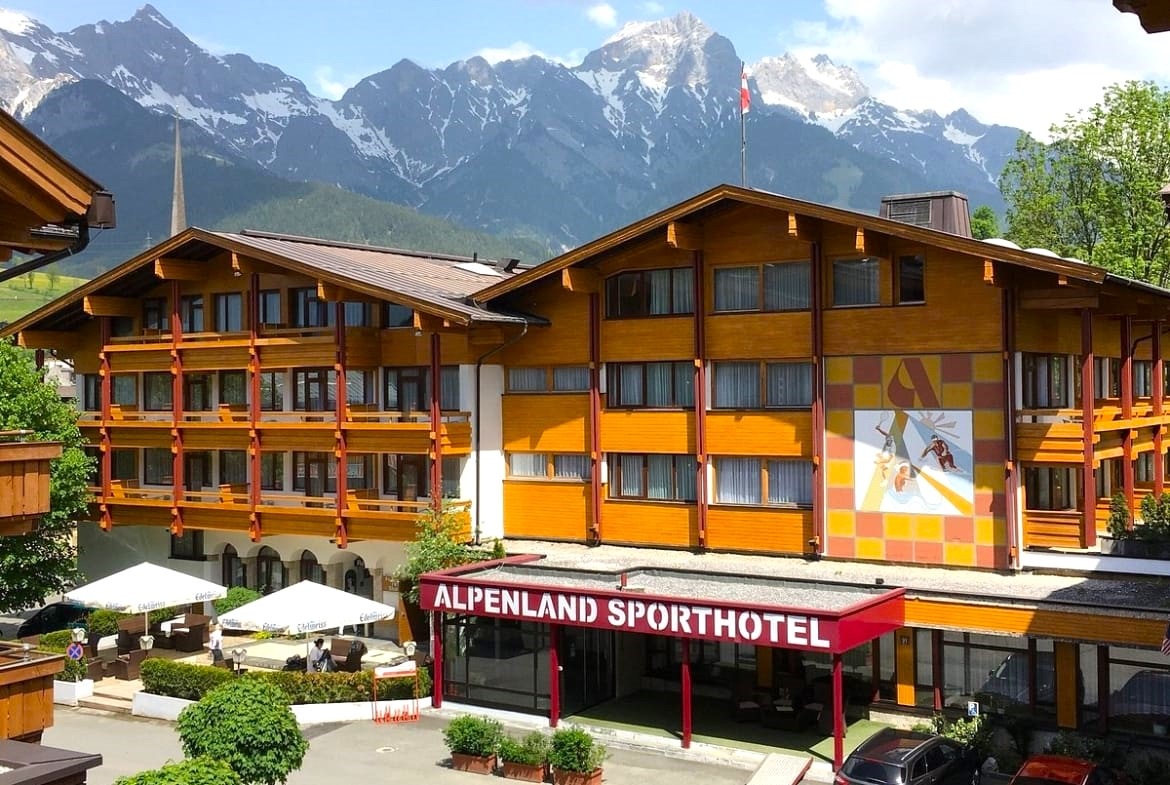 Alpenland Sporthotel mountians front view