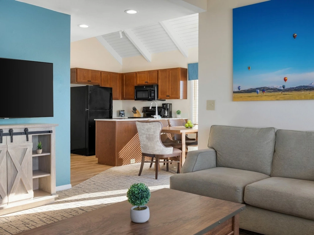 Bright and airy open-concept living and dining space in an Eagles Loft unit at the Pagosa Springs resort.