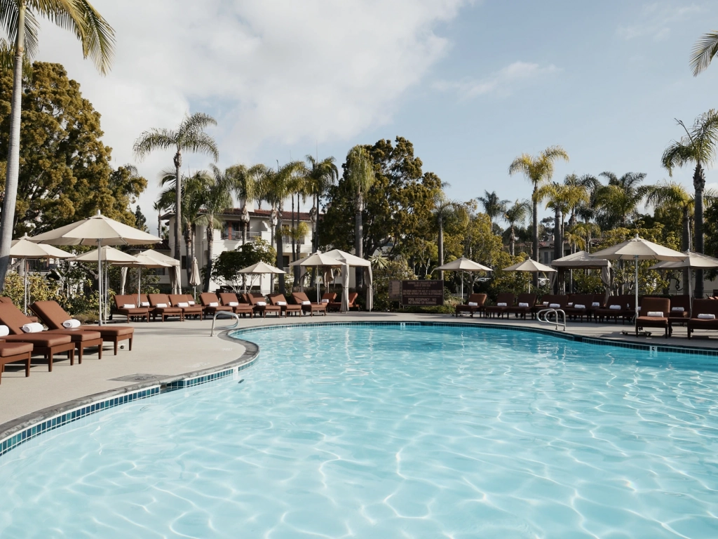 Enjoy the large outdoor pool and loungers at Four Seasons Aviara while considering fractional ownership vs timeshare.