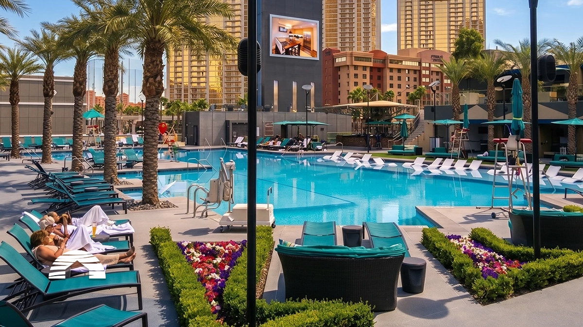 Large resort pool deck and lounge chairs, a top feature in elara las vegas reviews.