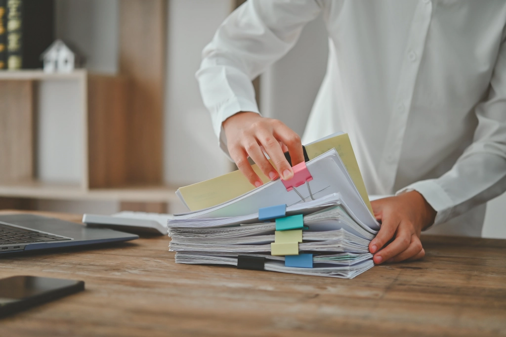 Stack of Papers on Desk