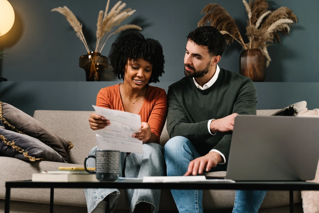 Timeshare Inheritance Couple Looking at Paperwork