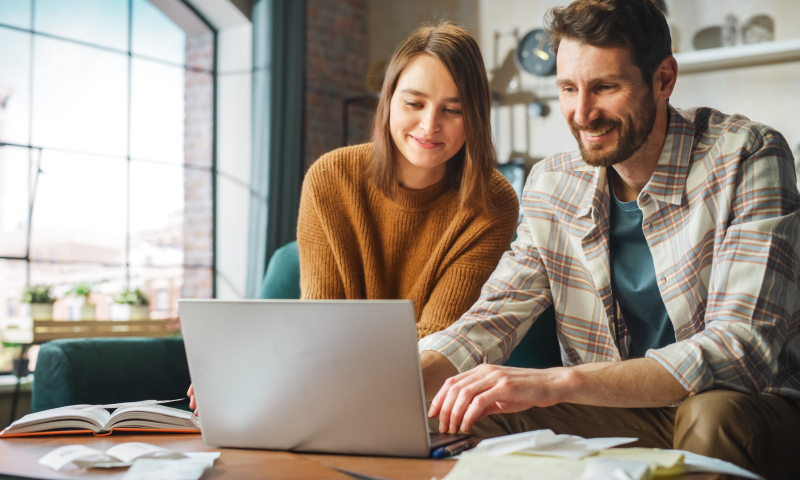 couple looking at computer